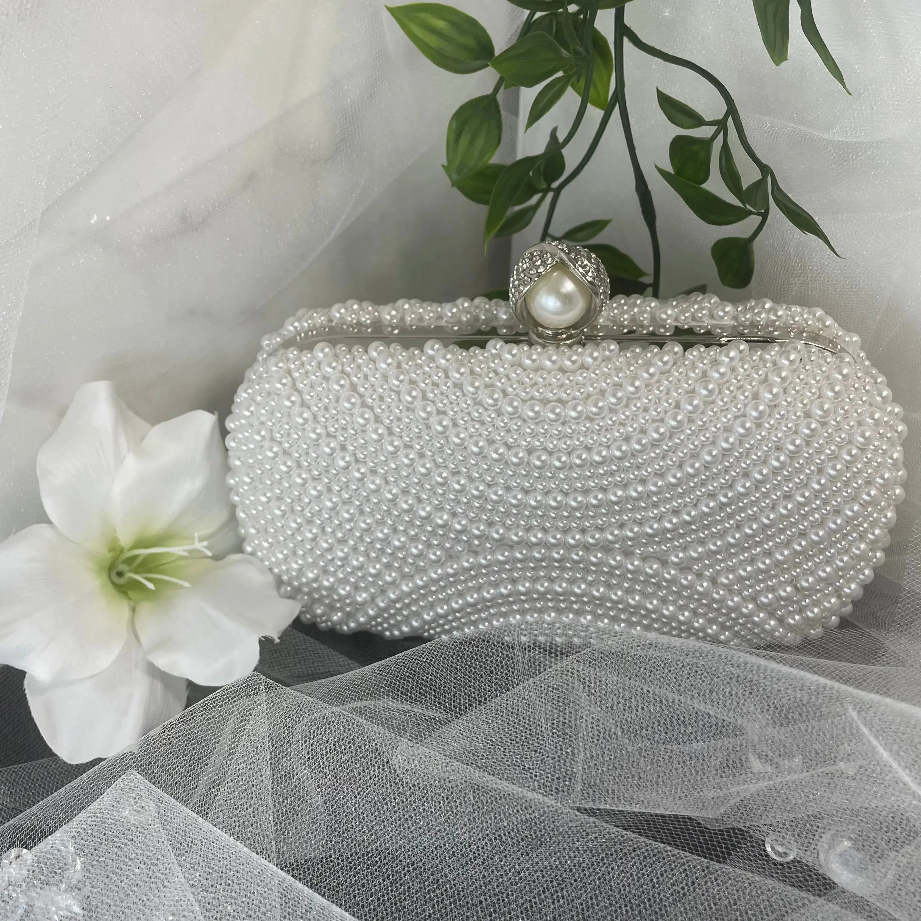 Divine Bridal's Exclusive Handbag Collection.