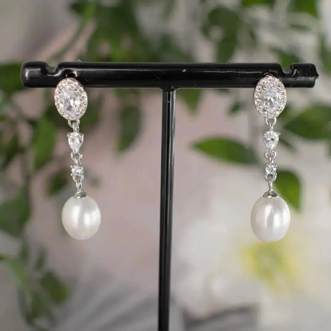 Pearl Earrings.