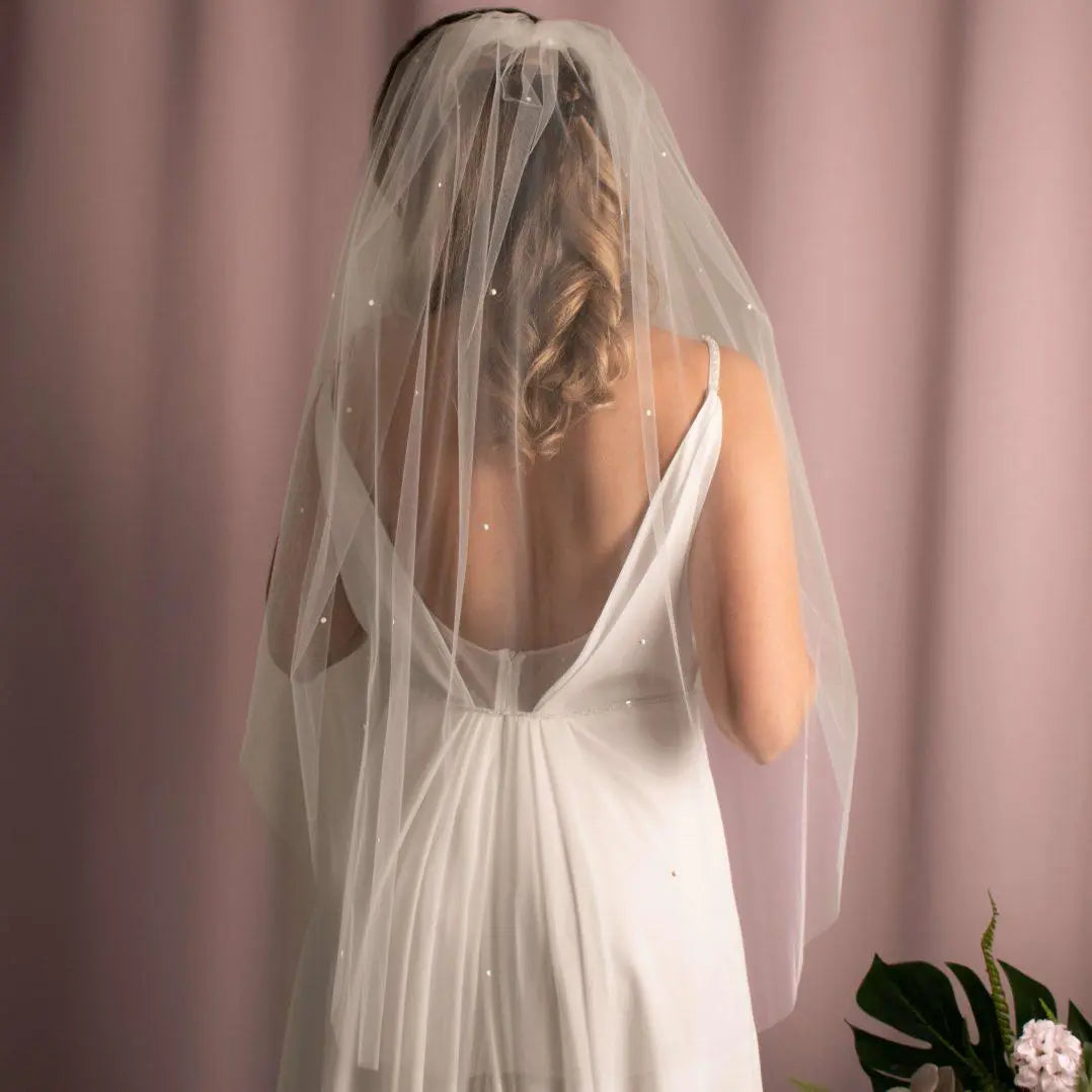 Amelia Scattered Pearl Veil featuring a delicate single-tier design with scattered pearls, in ivory, measuring 1 meter in length, perfect for modern brides.