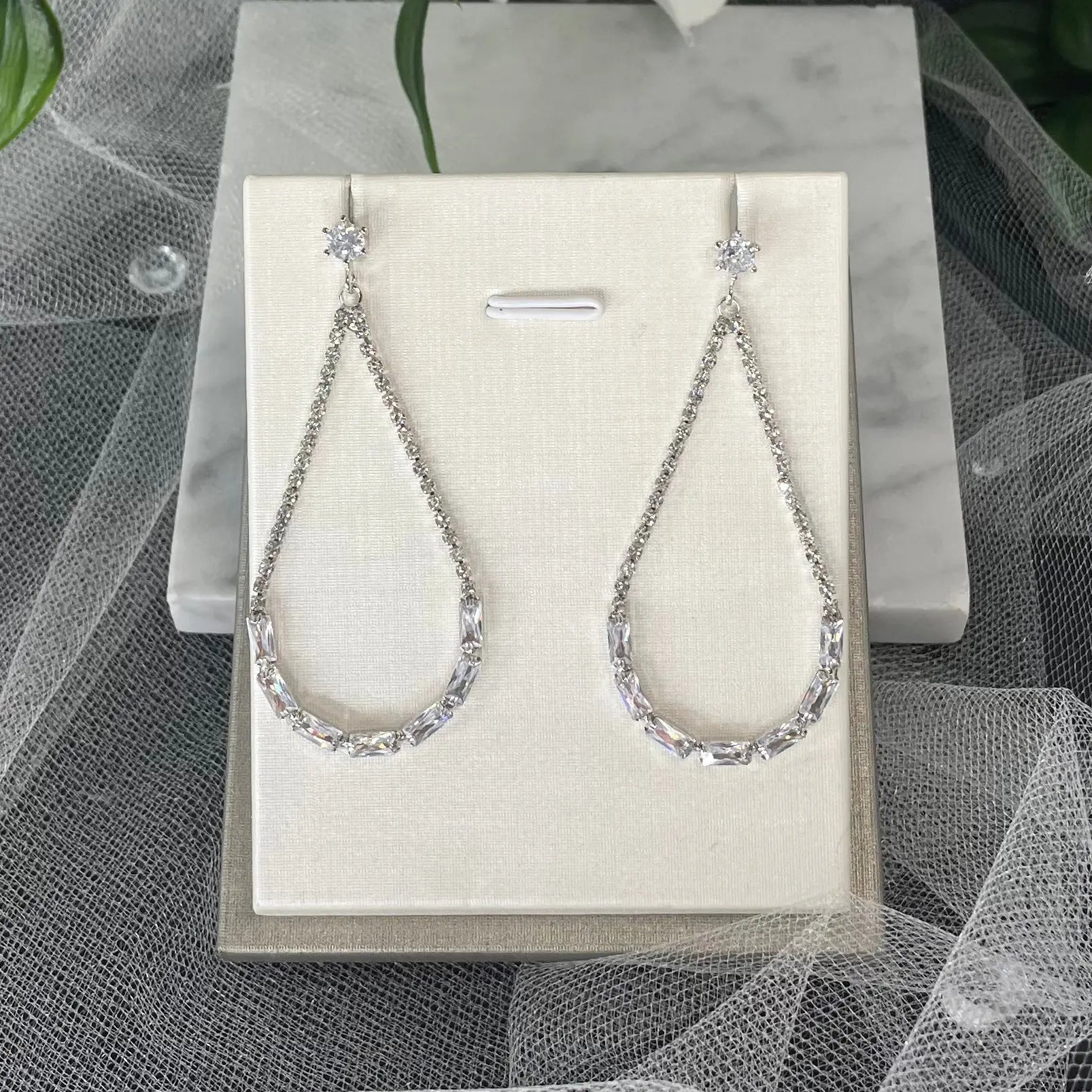 Andorra Teardrop Hoop Wedding Earrings featuring a unique modern design with crystals and diamantés, measuring 6 cm in total length and 2.7 cm at the widest point, perfect for weddings and special occasions.