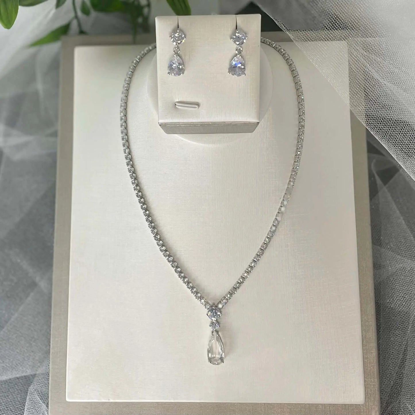 Anita Bridal Jewelry Set featuring a water drop rhinestone pendant and elongated earrings with zirconia crystals, silver-plated for a lasting shine, perfect for weddings and special occasions.