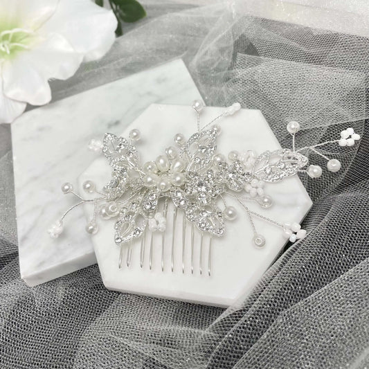 Betty Pearl Silver Leaf Hair Comb featuring a leaf design adorned with pearls and crystals, measuring approximately 12.5 cm by 6 cm, perfect for weddings and special occasions.