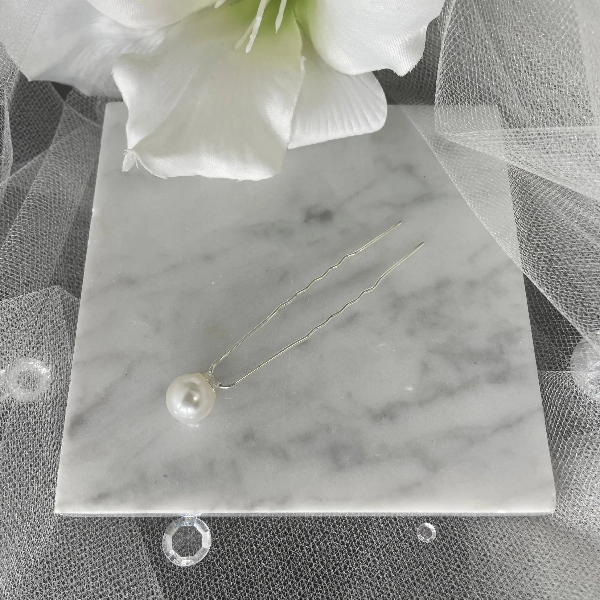 Bridal Pearl Hairpins on a silver base, perfect for enhancing wedding hairstyles with classic elegance and sophisticated pearl accents.