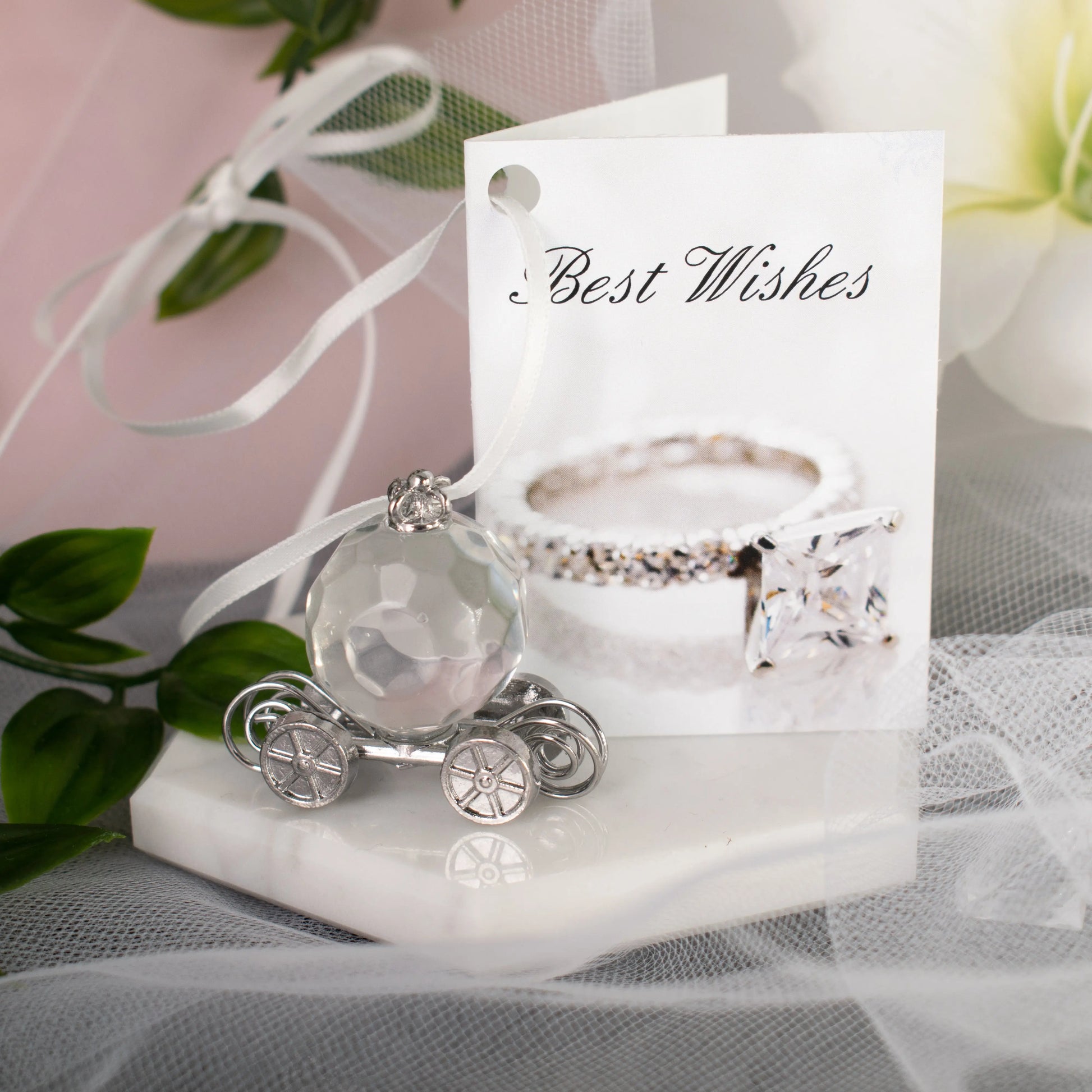 Cinderella Carriage Wrist Charm displayed on a wrist, showcasing its beautiful design as a perfect wedding charm.