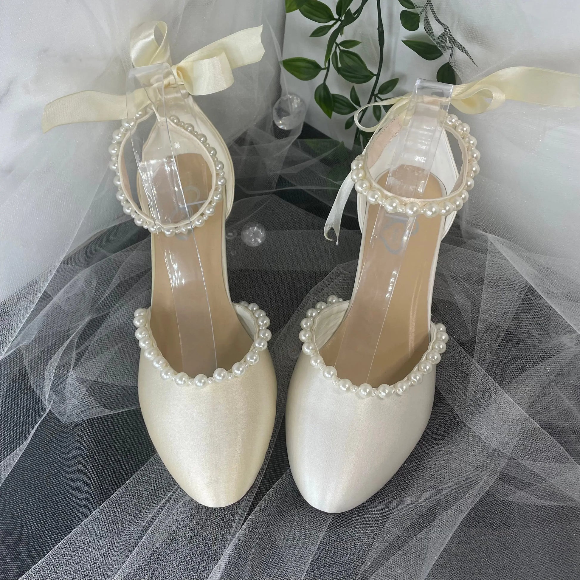 Dixie Bridal Shoe Front View Different Color: Front view of the Dixie Bridal Shoe highlighting the color difference due to display stock.