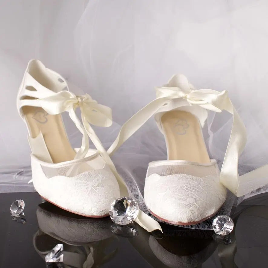 Elise Bridal Shoe Pair Front View: Front view of two Elise Lace Closed Toe Ankle Strap Wedding Bridal Shoes highlighting the intricate cut-out detailing and ankle strap.