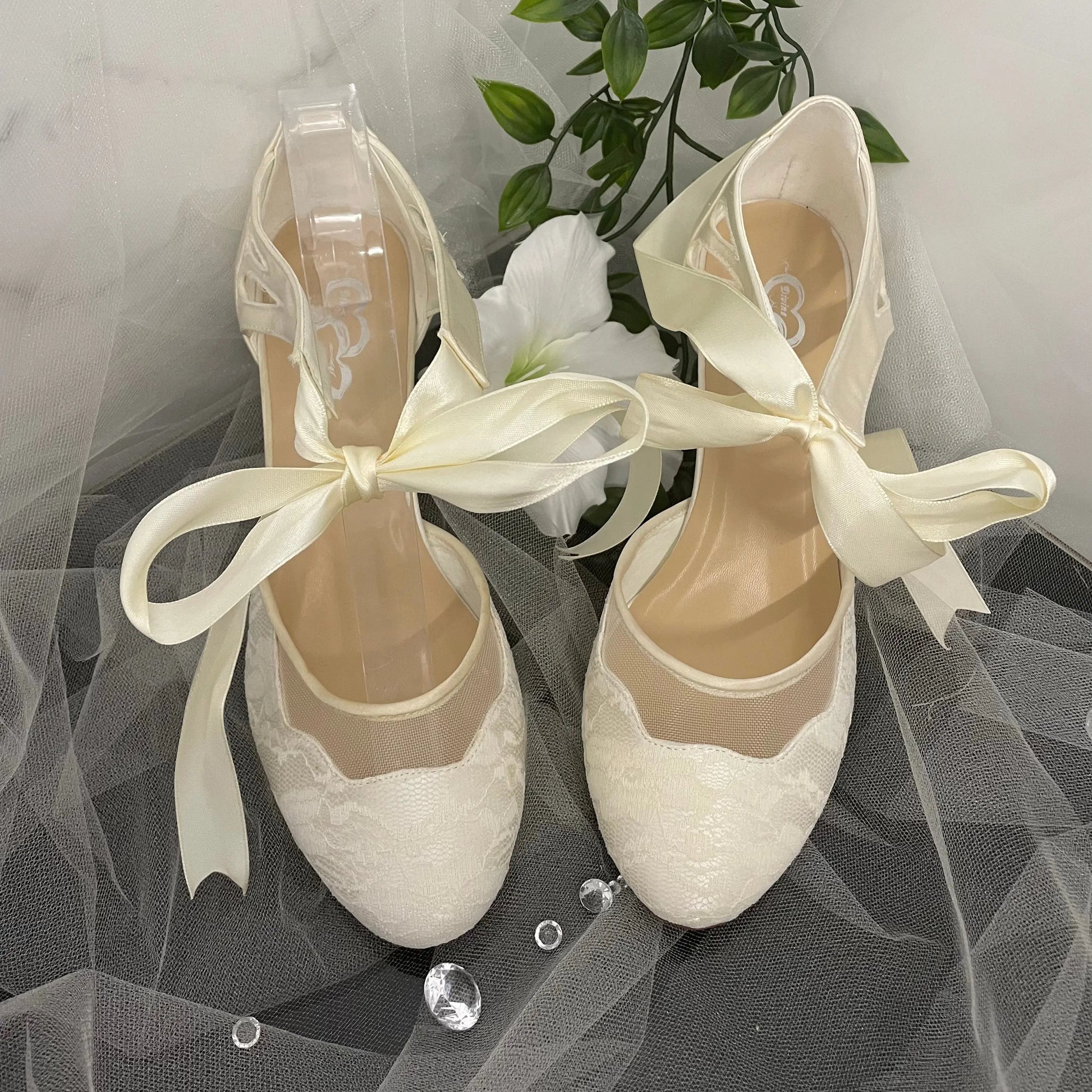 Elise Bridal Shoe Different Color View: View of the shoes showing the slight color difference due to display stock.