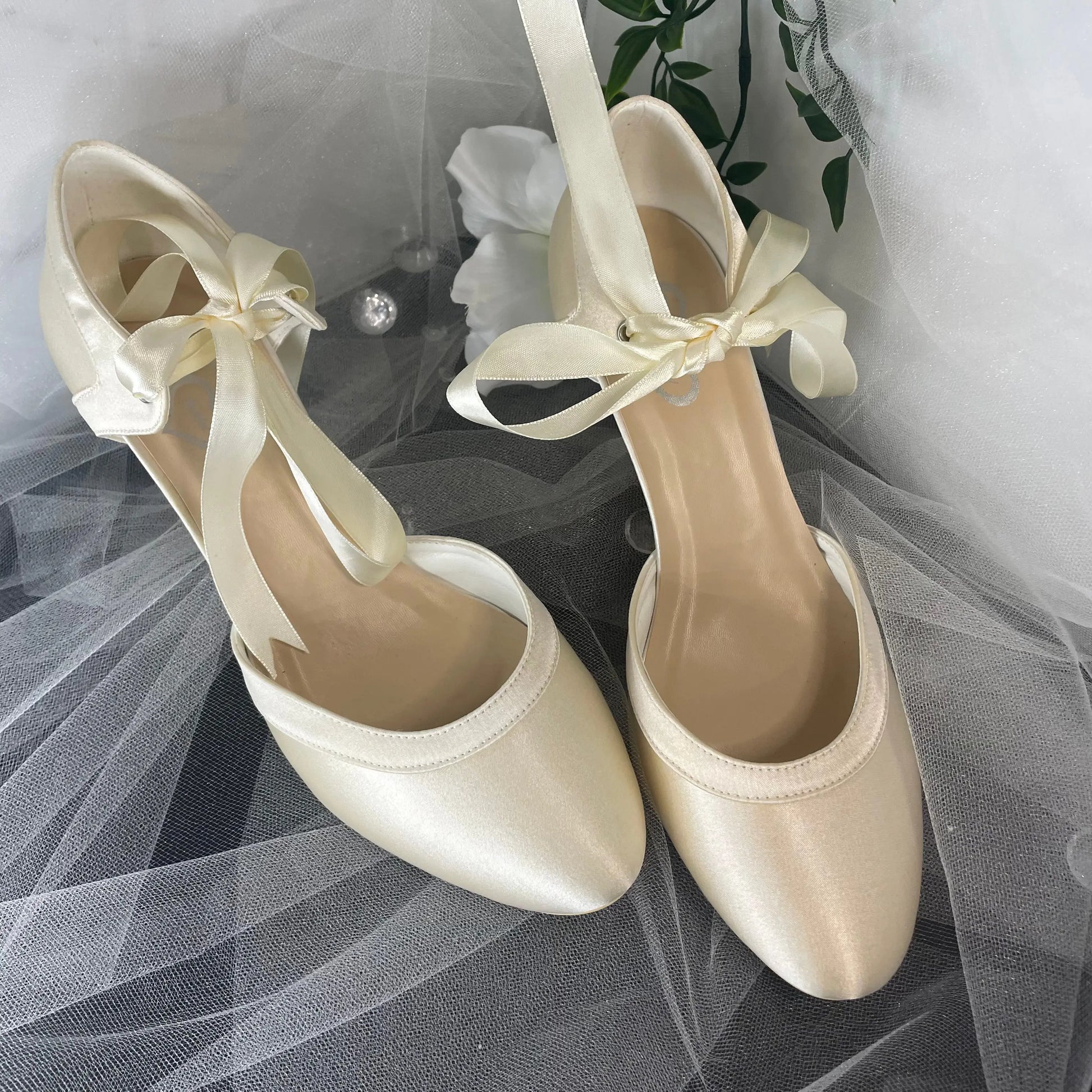 Ellie Bridal Shoe Pair Front View Different Color: Front view of two Ellie Closed Toe Ribbon Ankle Strap Wedding Bridal Shoes displaying the graceful design and color variation.