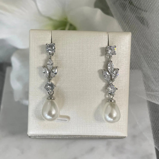Evelyn Drop CZ & Pearl Earrings (Silver): Elegant silver dangle earrings featuring round and leaf-cut CZ stones and a teardrop pearl, perfect for weddings and special occasions.