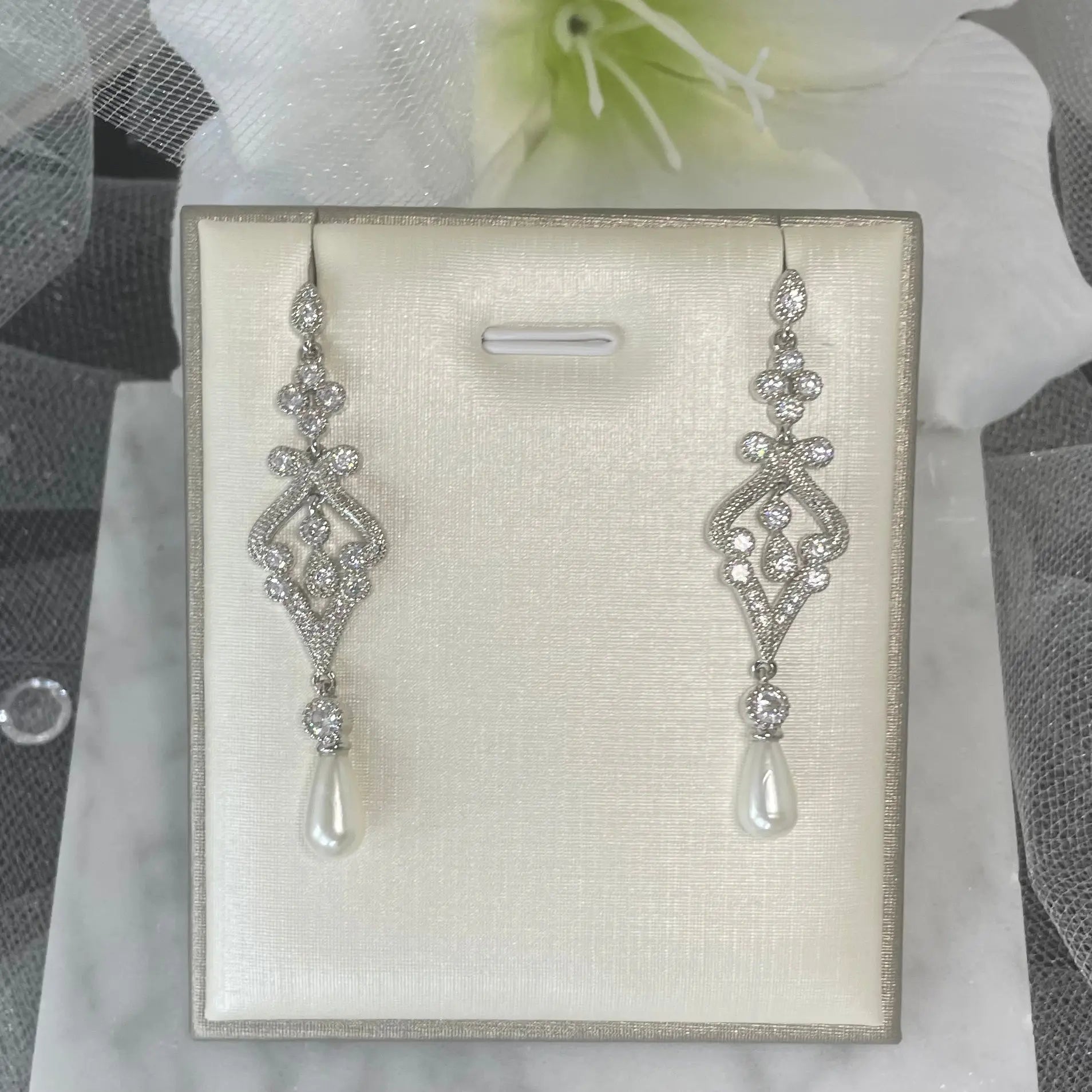 Maia Bridal Set featuring Indian-inspired design with CZ zircon inlay and teardrop pearl pendant on both earrings and necklace.