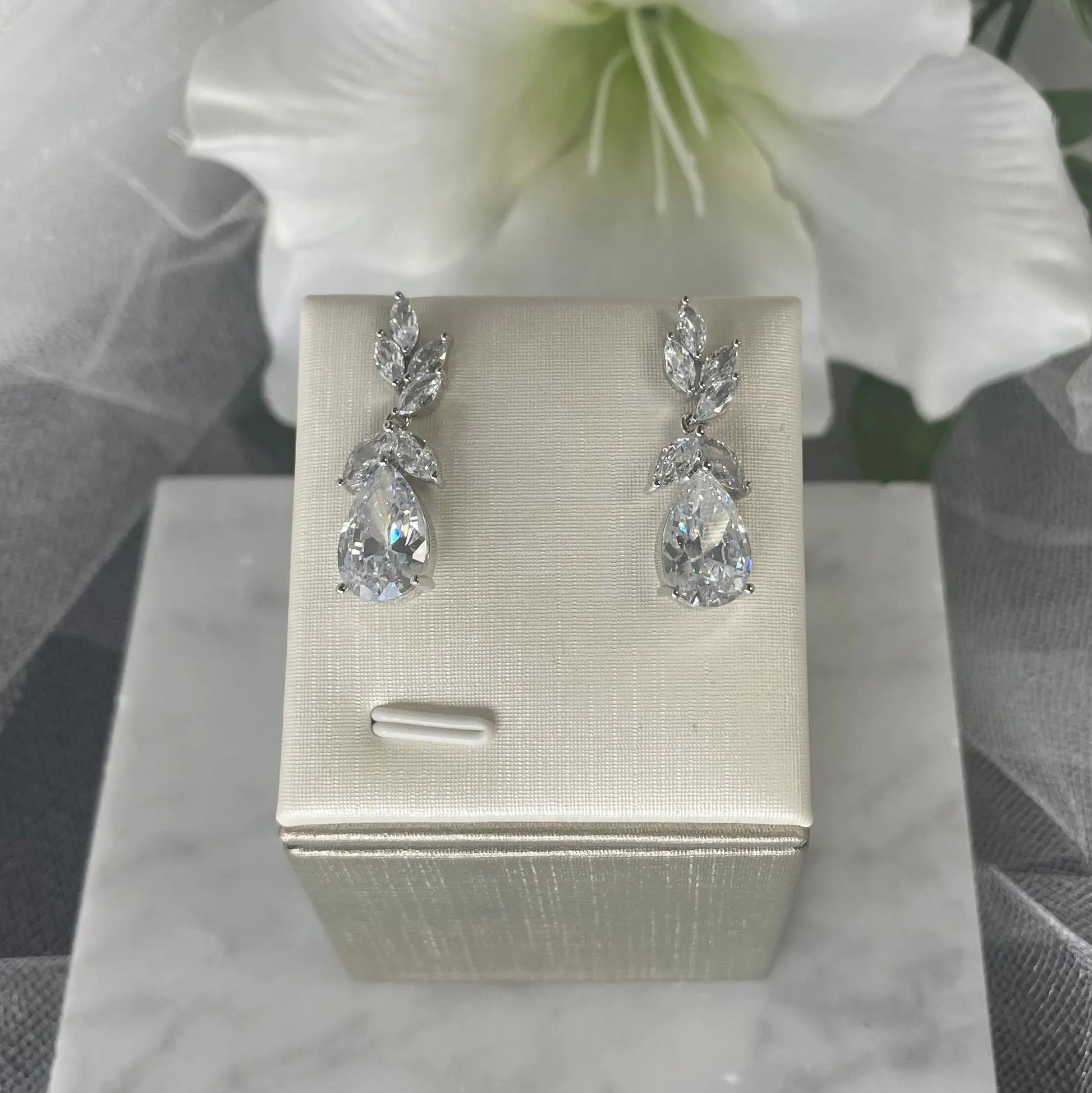 Maisie CZ Drop Bridal Wedding Earrings: Elegant bridal earrings featuring AAA zircon stones and a water drop crystal, perfect for weddings and special occasions.