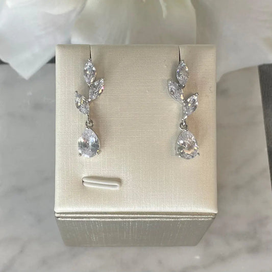 Millie Water Drop Leaf Bridal Wedding Earrings: Elegant bridal earrings featuring a leaf pattern with princess cut zircon stones and a water drop zircon, perfect for weddings and special occasions.
