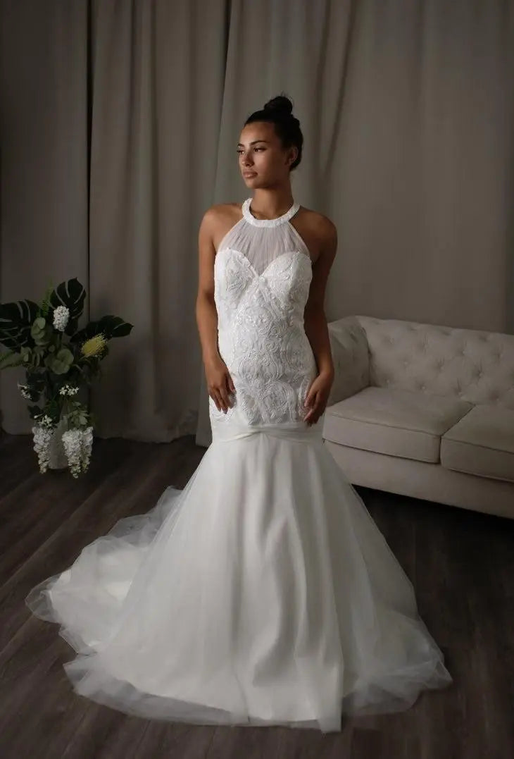 Remy – Halter-neck Sequin Mermaid Bridal Dress by Divine Bridal, showcasing a sparkling bodice and elegant train.