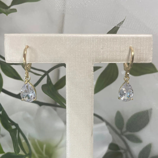 Close-up of Sabrina Gold Wedding Earrings with CZ teardrop, highlighting the intricate gold hoop and teardrop design.