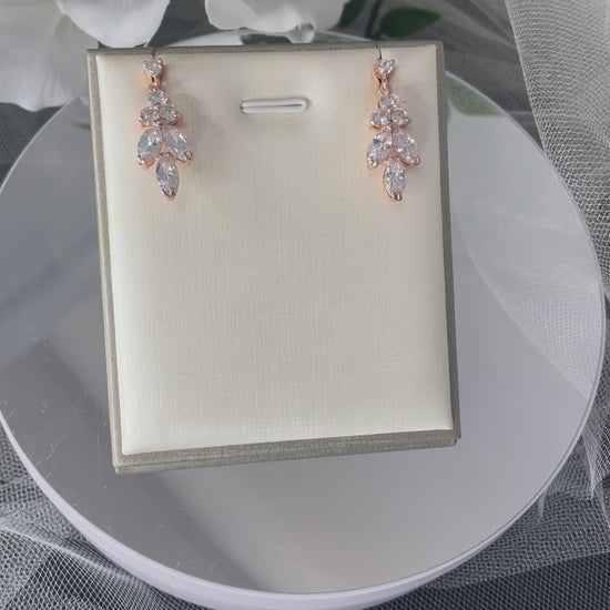 Video of All: A video showcasing the Jodie Leaf Flower Earring & Necklace Set, highlighting the elegant design and craftsmanship of both the silver and rose gold versions.