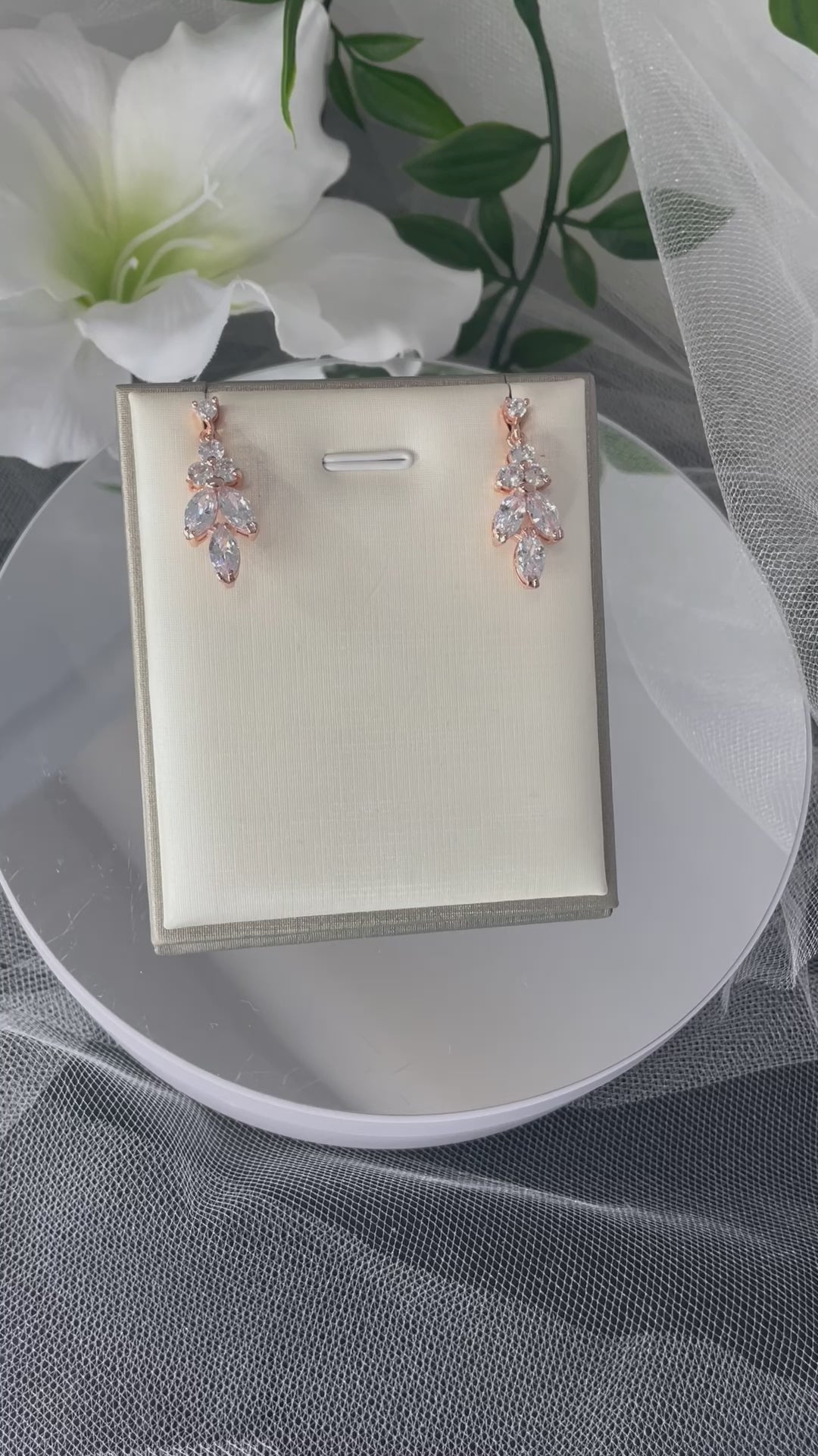Video of All: A video showcasing the Jodie Leaf Flower Earring & Necklace Set, highlighting the elegant design and craftsmanship of both the silver and rose gold versions.