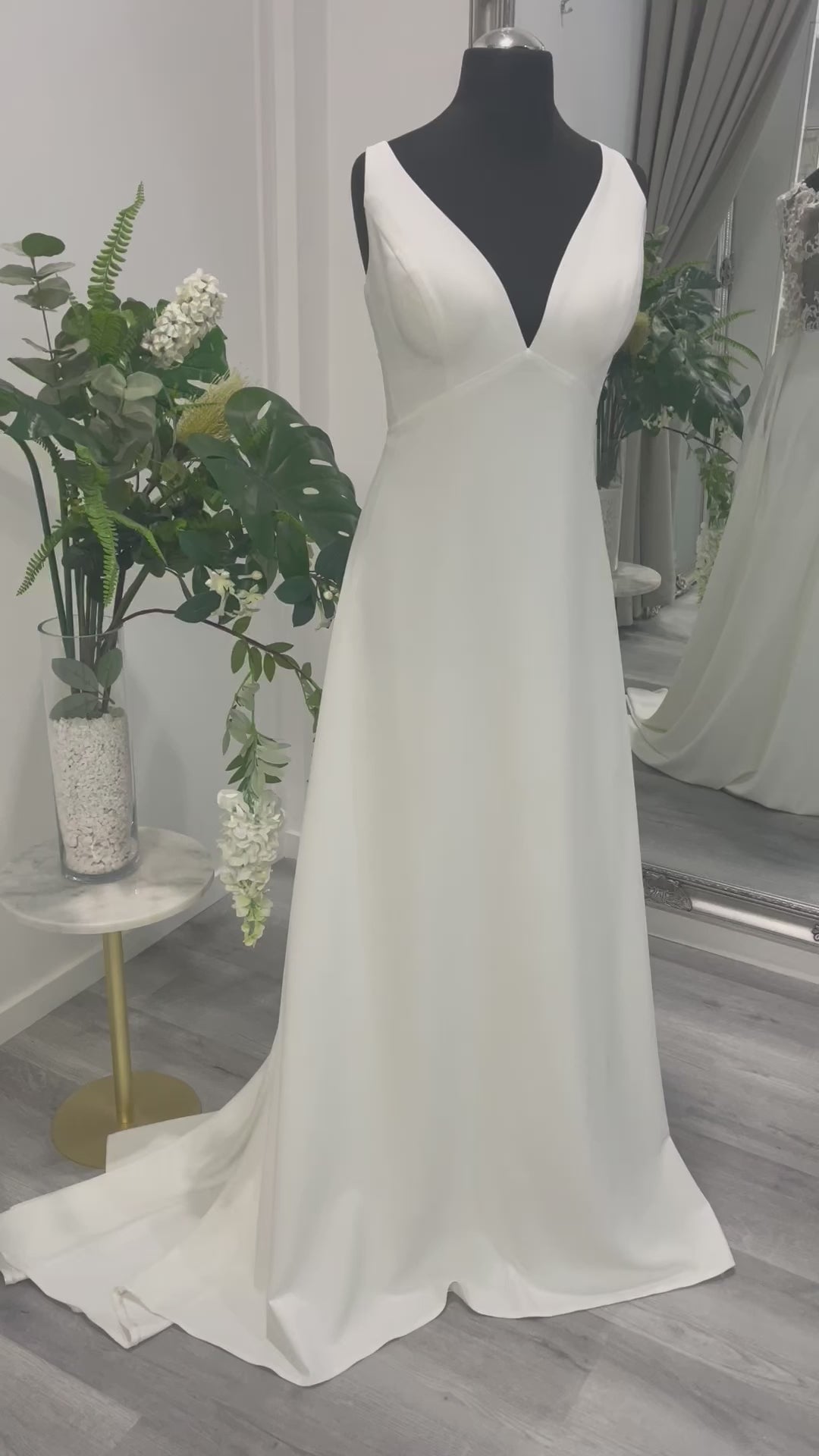 Isolde Wedding Dress - A minimalist design with elegant silhouette on display at Divine Bridal.