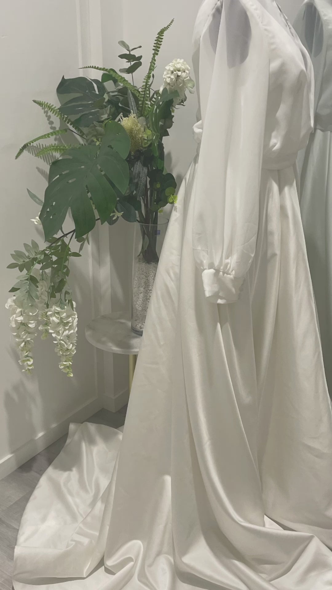 Video showcasing the Cleo Bridal Bolero in elegant georgette fabric, featuring detailed views of the covered buttons and loop closures on the back, ideal for brides looking for classic and sophisticated wedding attire.