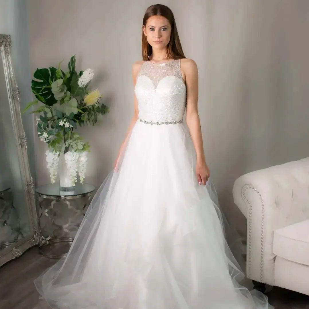 Ruth Sparkly Wedding Dress With Glittery Tiered Skirt.